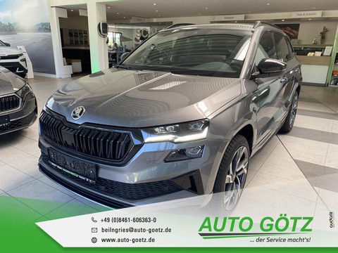 Skoda Karoq Sportline LichtAssist Induktiv Laden Frontscheibenheiz vo hi VZE SpurAssist Sunset Armlehne Connect RÃckbank geteilt Metallic
